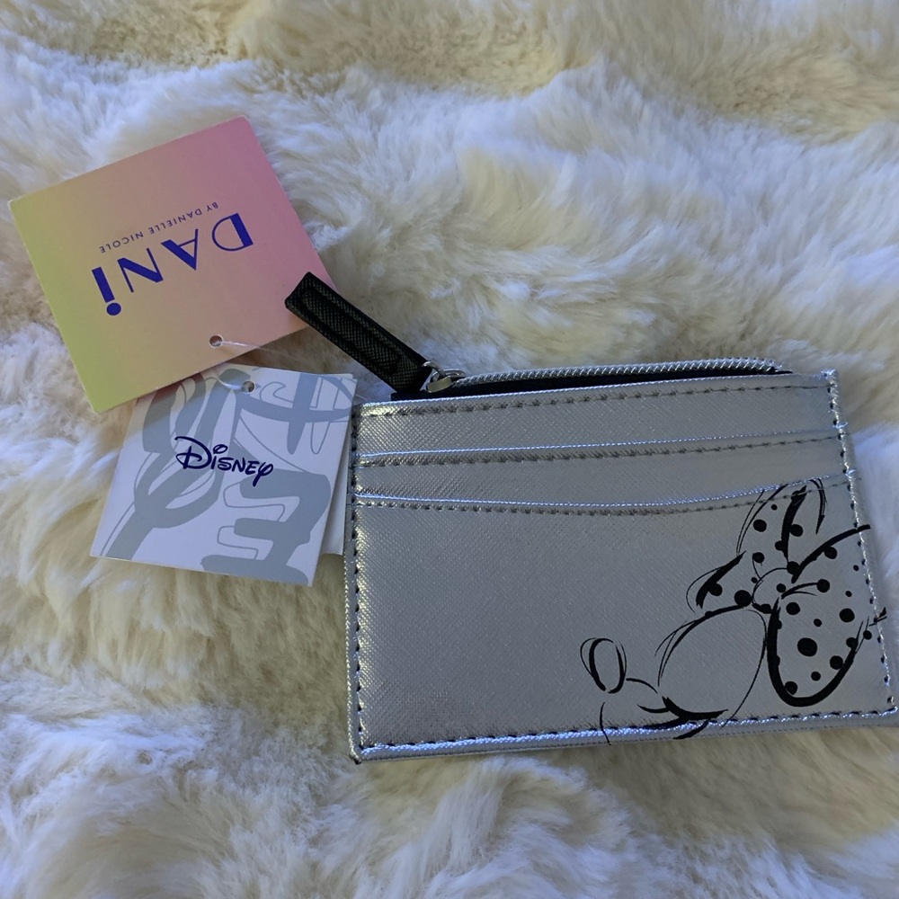 Wallet by Danielle Nicole Disney theme. Silver 4” x 2 1/2”